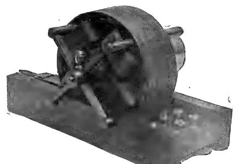 1894 engraving, fig. 298, printed p. 480: Laminated-iron ring field with an armature on cross bolts, on a plank base